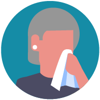 woman covering their mouth when coughing